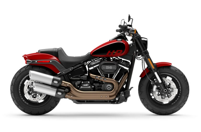 Das Bild zeigt eine Harley-Davidson Motorräder im sportlichen Design mit einem markanten roten und schwarzen Farbschema, ideal für Motorradliebhaber.